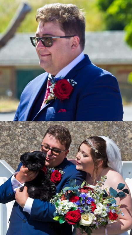 Bride and groom on their wedding day. He has a rose buttonhole and her bouquet is made of red and white flowers.