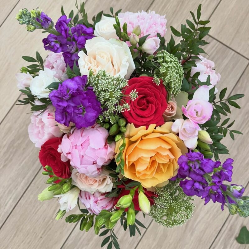 Wedding bouquet of Peonies White Lisianthus, Dill, Purple Stock, Deep Pink & Blush Roses, White Freesias, Huckleberry Foliage