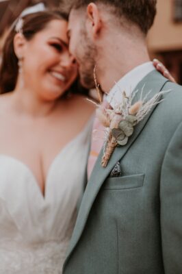Bride and Groom look lovingly at eachother