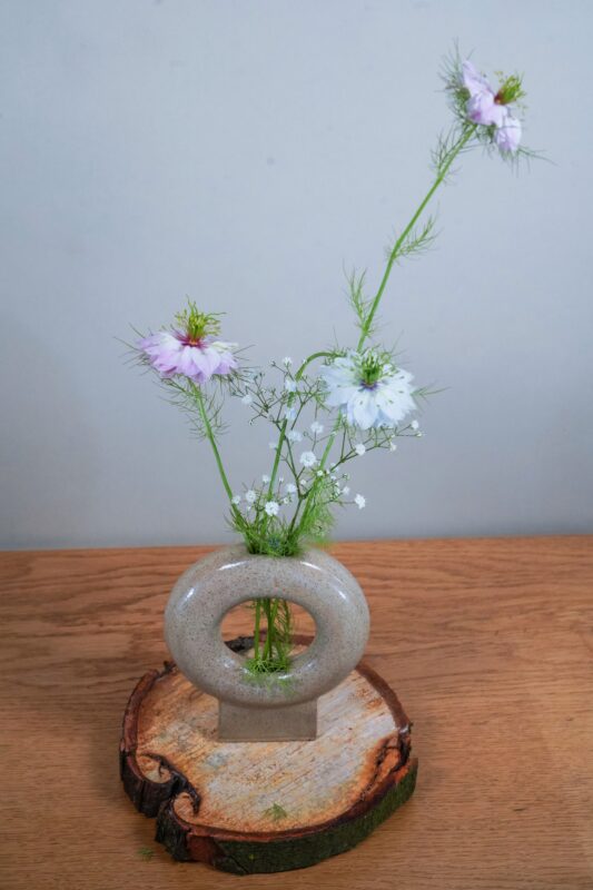 Blooming Roza Flowers in Mudfired Pottery